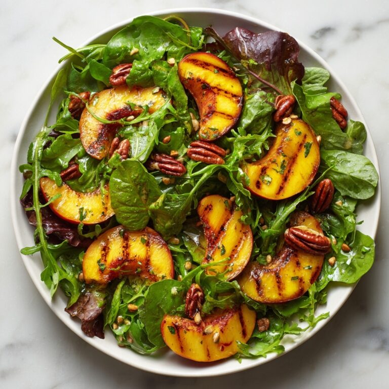 Grilled Peach Salad with Honey Vinaigrette, Candied Curry Pecans, and Blueberries Recipe
