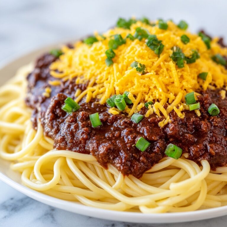 Classic Cincinnati Chili with Spaghetti and Toppings Recipe